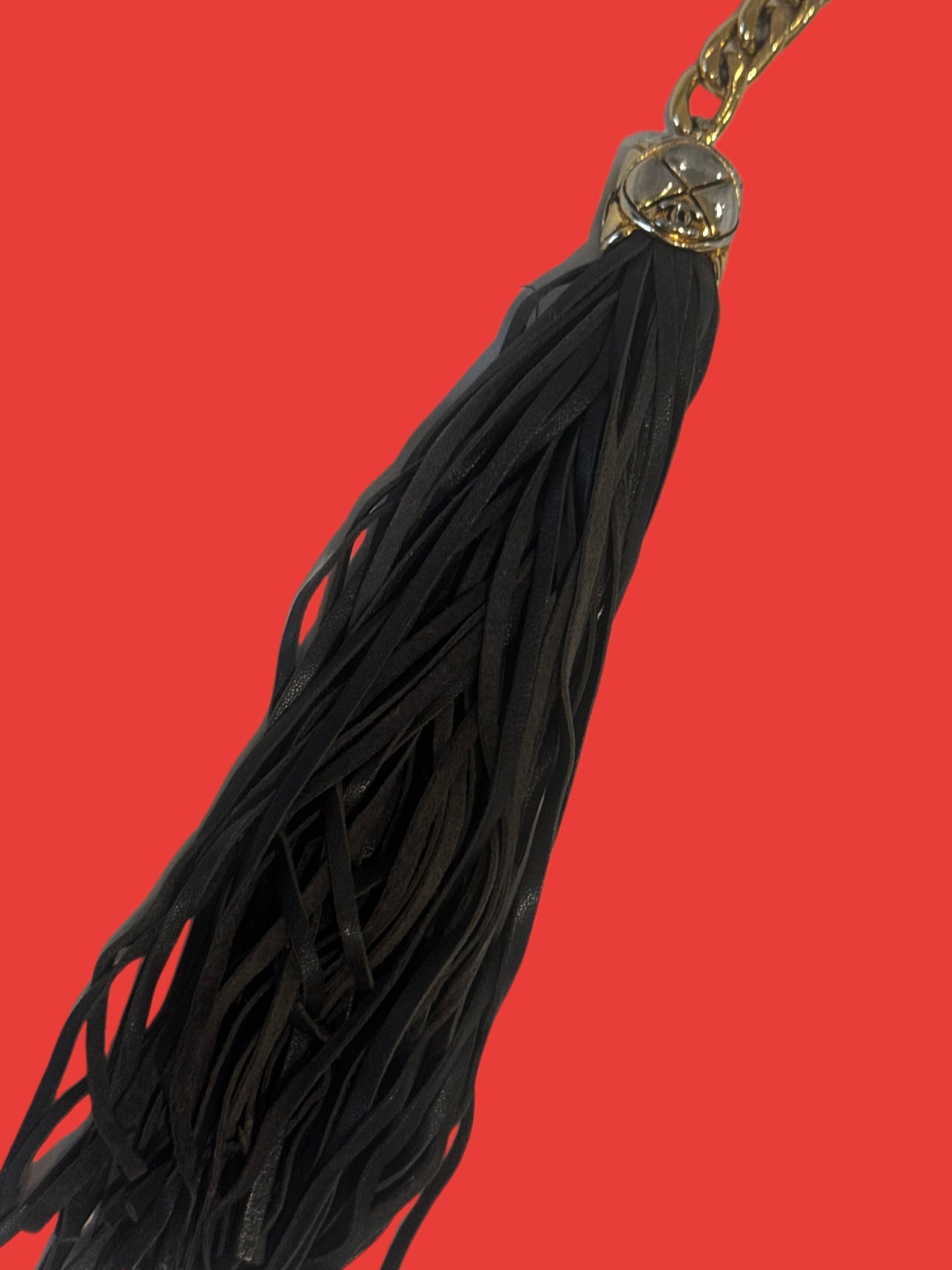 Ultra-Rare Vintage CHANEL Gold-Tone Chain with Black Tassel
